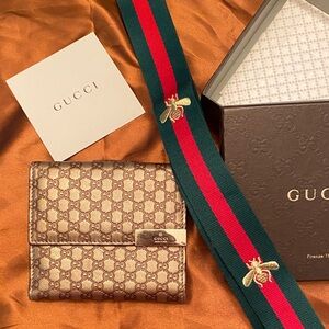 Gucci Guccissima gg pattern embossed gold wallet